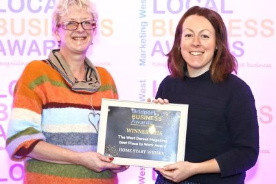 Debbie-Phillips-White-of-Home-Start-Wessex-accepting-the-Bridport-Best-Place-to-Work-Award.jpeg