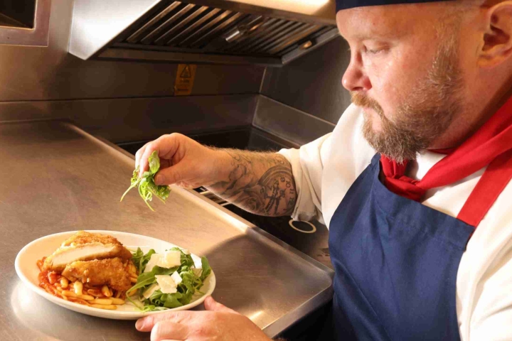 LNER-Chef-with-new-First-Class-dish_cropped-scaled-1.jpg